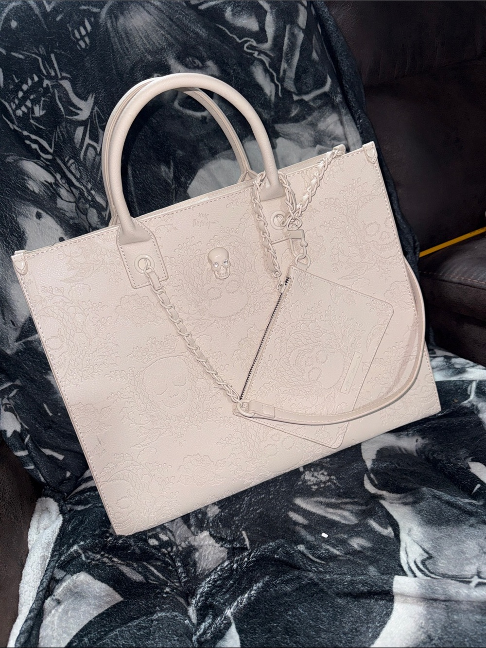 Betsey Johnson Pale Embossed Tote with Chain Accent and Pouch Viral Skull Design